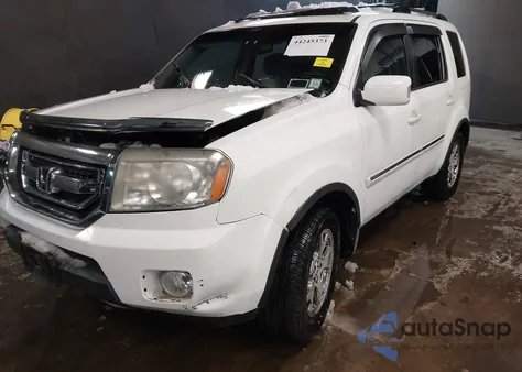 2010 Honda Pilot Touring z USA, uszkodzony, nr VIN 5FNYF4H89AB029485